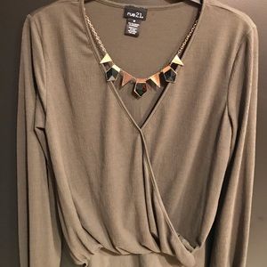 Green blouse with necklace